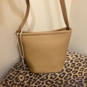 Ela Tan Leather bucket Crossbody Bag
